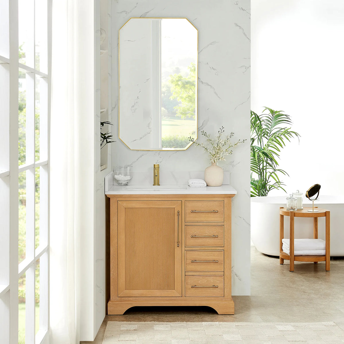 Bathroom scene with an octagonal mirror and a 36 inch single vanity, marble-look walls and tall windows