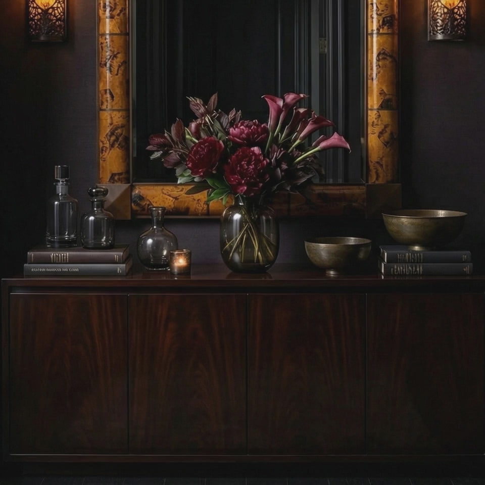 Short product video of Ambella Home Delancy Mirror in tortoise shell finish, 38W x 3D x 56H rectangular wall mirror above a dark credenza in a moody luxury hallway