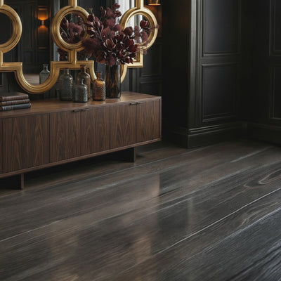 Short product video of Ambella Home Voranado Mirror in burnished gold leaf, 99W x 3D x 43H oversized geometric wall mirror above a dark credenza in a luxury hallway