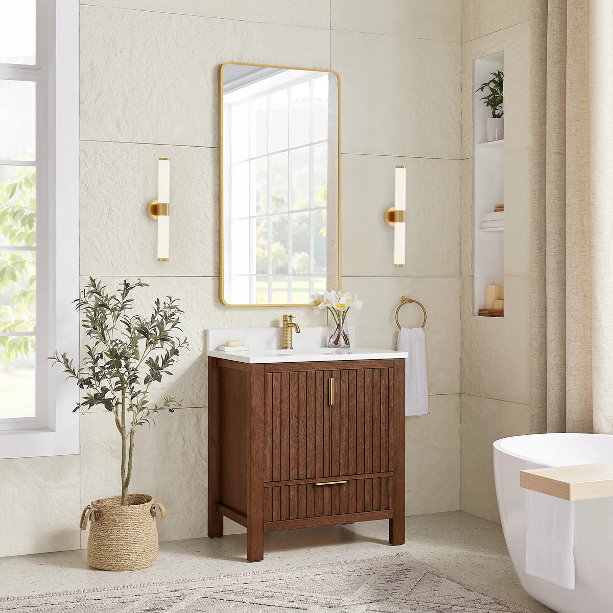 Second angle: the 30-inch Aged Dark Brown Oak vanity with a matching gold mirror, sconces, a plant and a tub at right