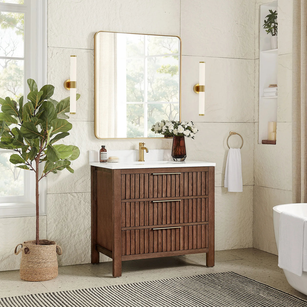 Second angle: 36-inch cabinet in Aged Dark Brown Oak with a matching rectangular mirror in a gold frame and a plant