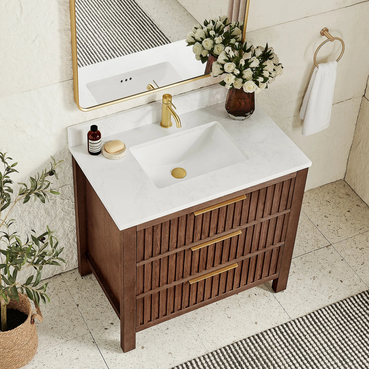 Top-down angle: a stone-composite top and ceramic undermount basin on the 36-inch Aged Dark Brown Oak cabinet