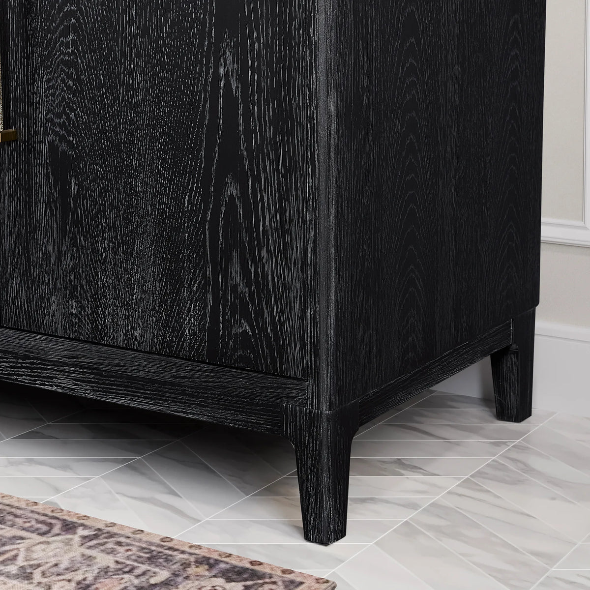 Leg and side panel of the 48-inch cabinet at floor level