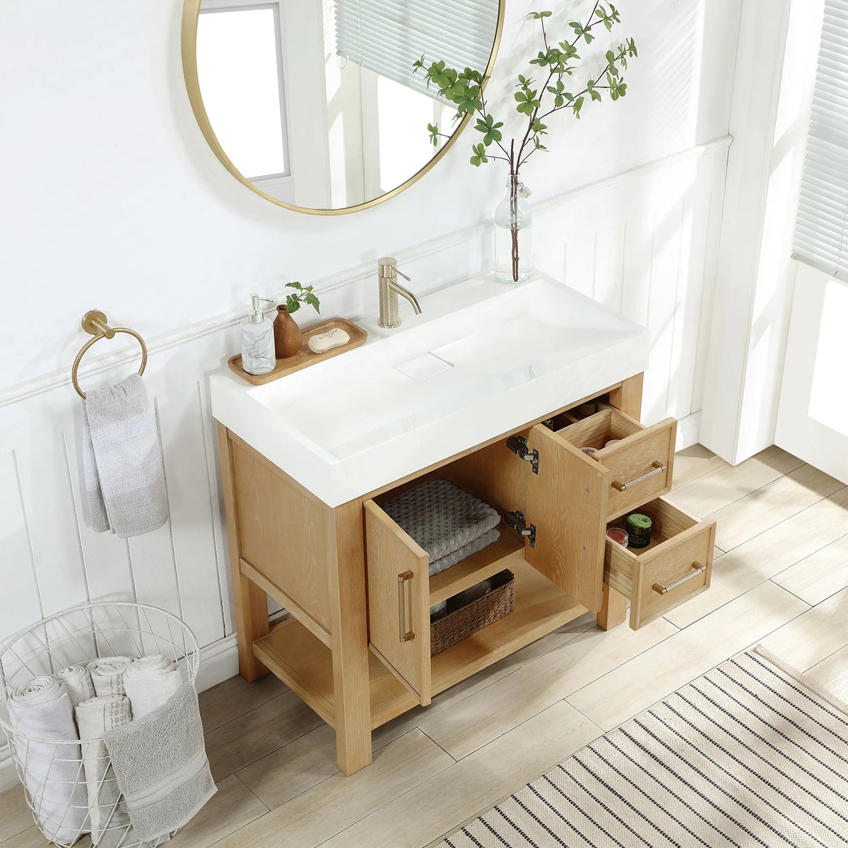 Open storage: drawers pulled out and a door ajar on the freestanding cabinet, 36-inch model