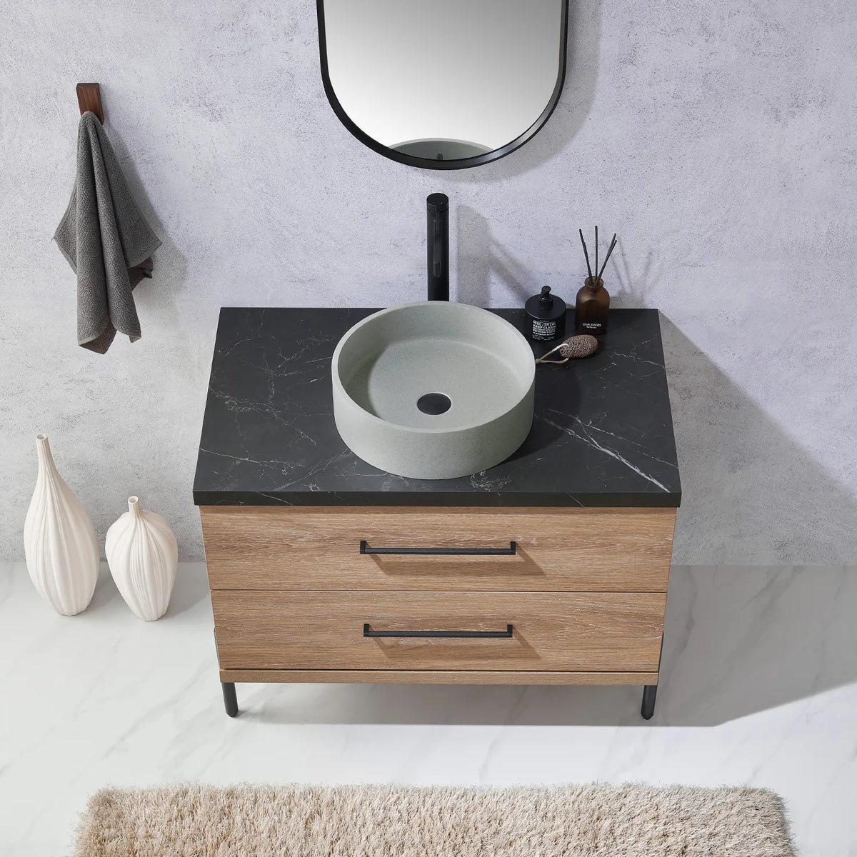 Head-on look at the sink area with the mirror edge cropped at the top
