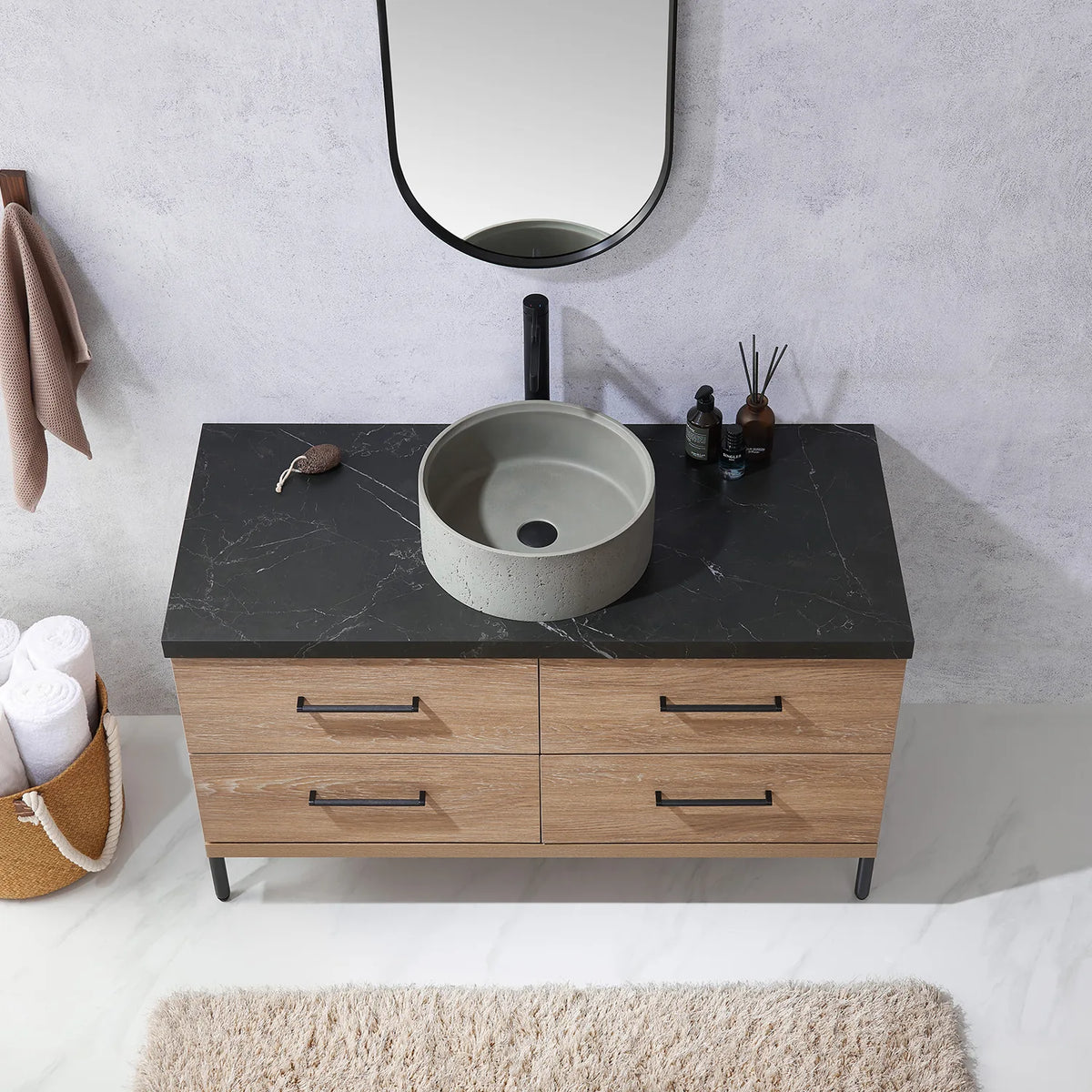 Head-on look at the sink area with the mirror edge cropped at the top