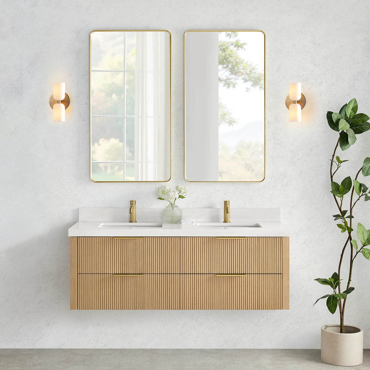 Wall-hung vanity in Washed Ash Grey with two tall mirrors set between two wall sconces on a textured wall