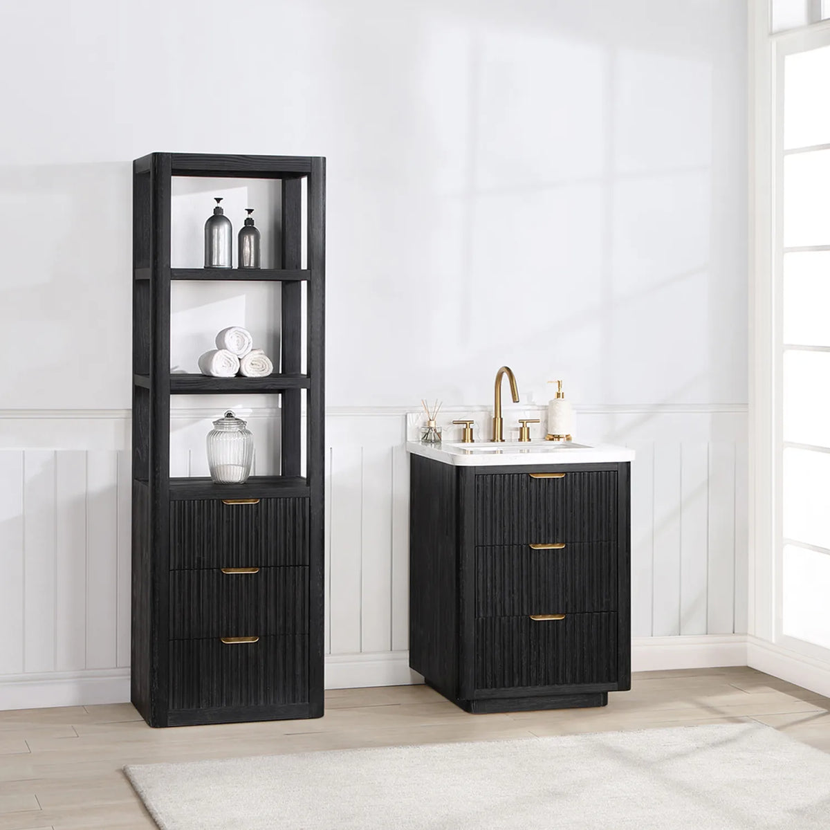 Bathroom scene with the 24 inch Fir Wood Black vanity, drawers open, on a pale plank floor with a rug