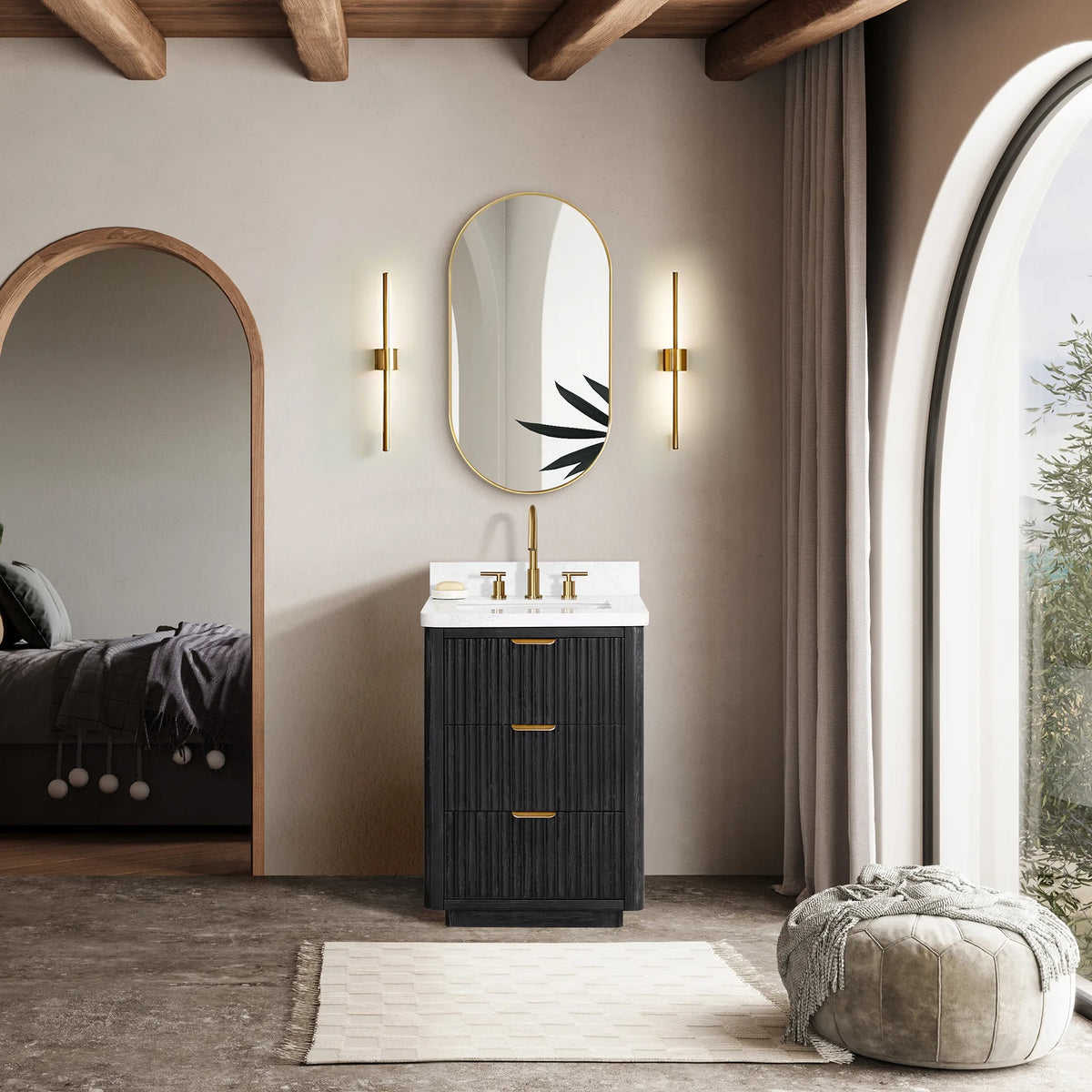 Styled bedroom-bath scene: 24 inch Fir Wood Black vanity under an oval mirror between two wall sconces