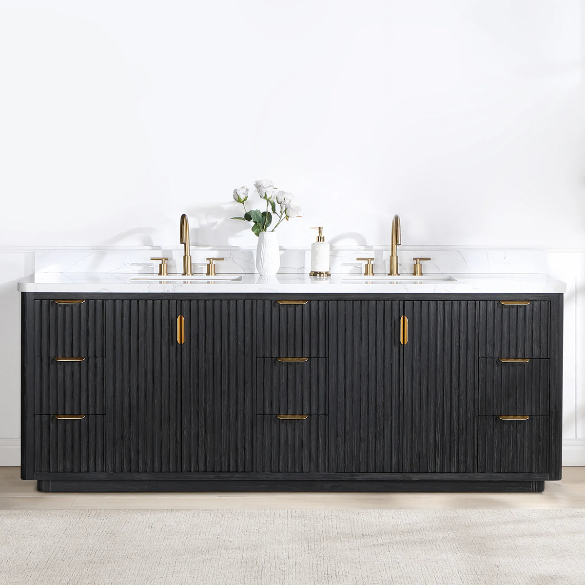 Freestanding 84 inch double vanity in a bright, plain-walled bathroom with widespread faucets and a soap dispenser