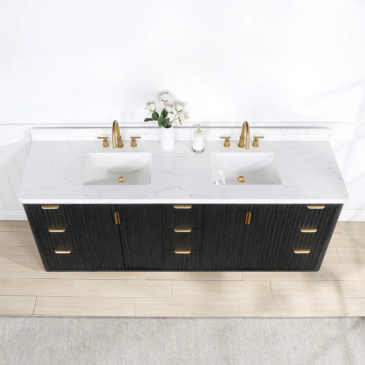 Close view of the 84 inch vanity top with undermount sink and faucets, doors and drawer fronts beneath