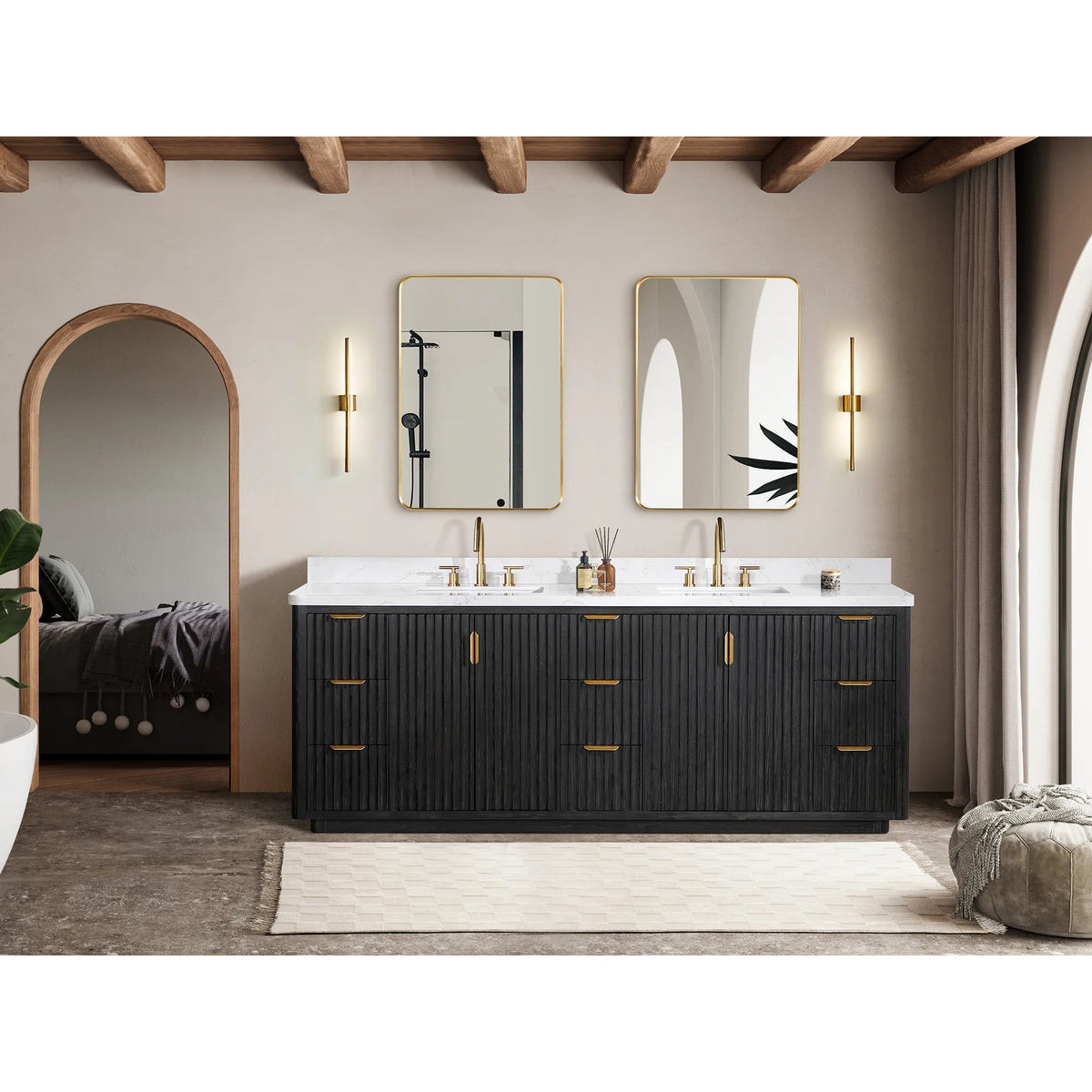 Wide view of the vanity below two rectangular mirrors, with arched openings and a rug